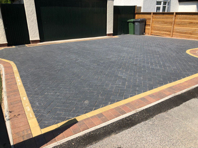 Tarmac garage frontage.